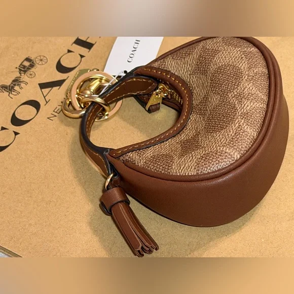 Coach Mini Carmen Bag Charm in Signature
Canvas NWT - Picture 2 of 5